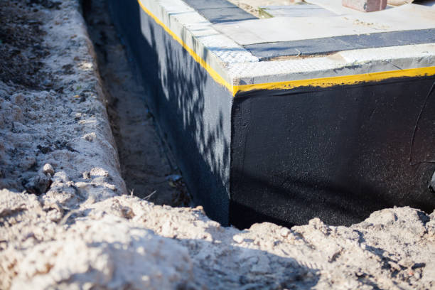 Professional Emergency Waterproofing technician working in Elbridge, NY